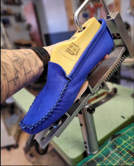 Moccasin shoes stand tools